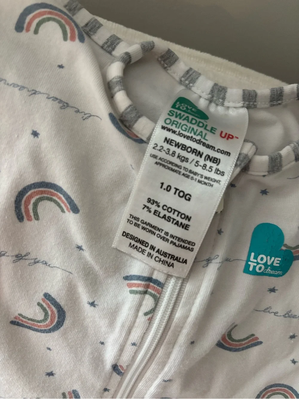 Love to Dream Baby Swaddle Sack in White with Rainbow Print